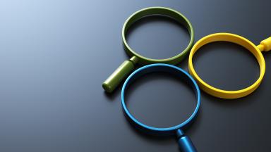 Image avec trois loupes de couleurs jaune, bleu et vert