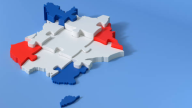 Carte de la France façon puzzles en bleu, blanc et rouge